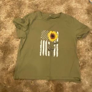 Army green shirt with a sunflower and an American flag
